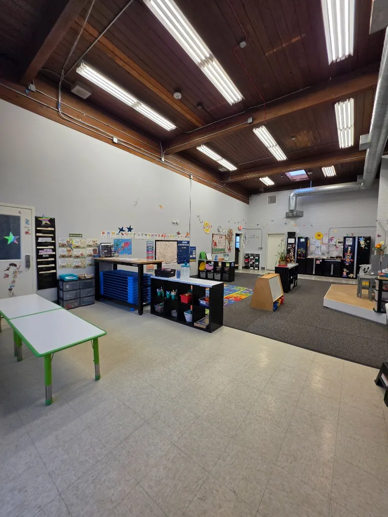 Harwell School Beaverton indoor 1,000 sq ft play space and movement studio with timber beam ceiling